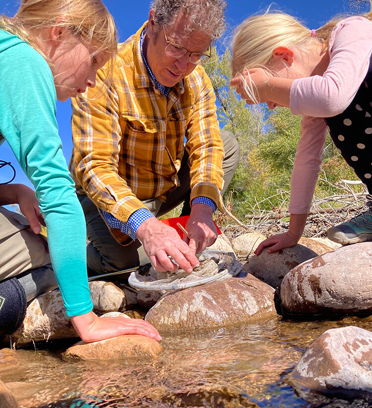 Investigating stream invertebrates with Volo, an alternative to private school near Park City.